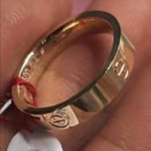 18k Saudi gold . Cartier logo and stamp.